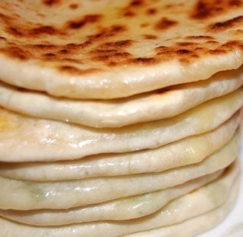 Невероятно вкусная вещь хичины с сыром и зеленью, и еще с картошкой и зеленью. 06